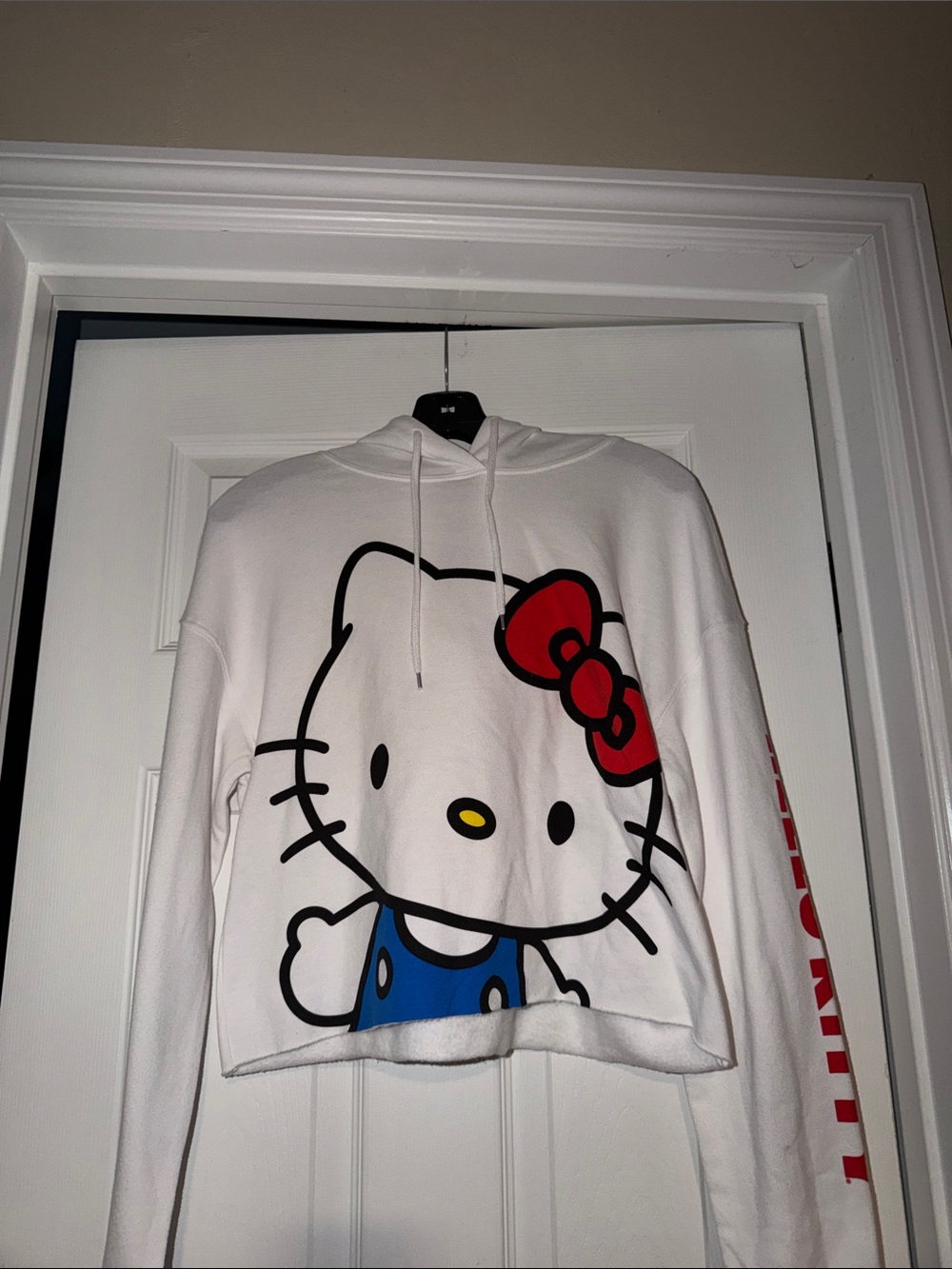Hello Kitty White Pullover with Red Sleeve Lettering